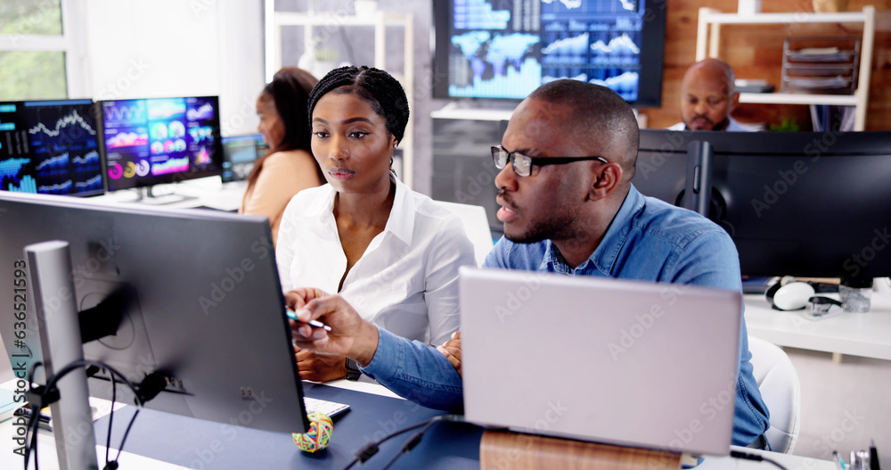 Poster african financial data analysts using dashboard on screens