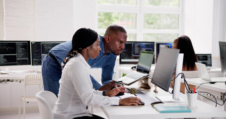 Fototapeta na wymiar African Business Team Working On Computer