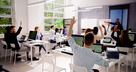 Teacher Showing Presentation To Diverse Group