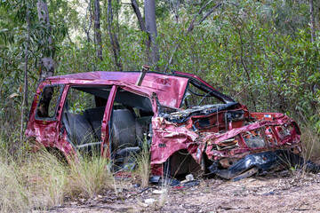 Dumped motor vehicle in bushland Sydney Australia