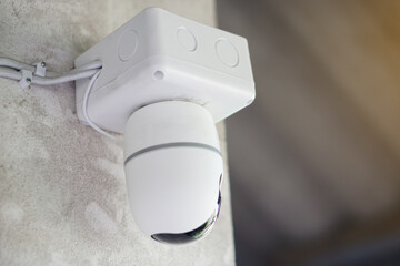 Mini CCTV security camera system installed on the wall. Concept, technology device for security,...