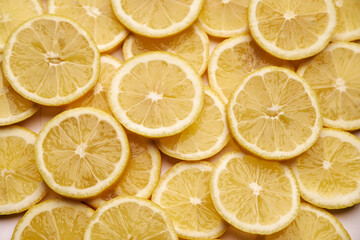 top down background view made of Fresh Sliced organic lemons close-up