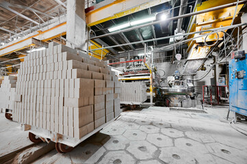 Large stack of raw concrete foam bricks in plant workshop