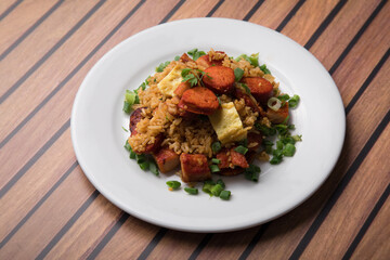 Chaufa amazonico fried rice with chorizo and  smoked pork cecina peru peruvian food