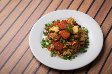 Chaufa amazonico fried rice with chorizo and  smoked pork cecina peru peruvian food