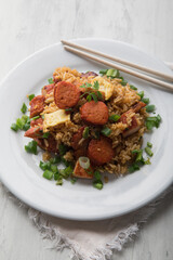 Chaufa amazonico fried rice with chorizo and  smoked pork cecina peru peruvian food