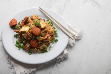 Chaufa amazonico fried rice with chorizo and  smoked pork cecina peru peruvian food