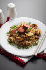 Chaufa amazonico fried rice with chorizo and  smoked pork cecina peru peruvian food