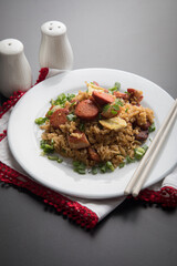 Chaufa amazonico fried rice with chorizo and  smoked pork cecina peru peruvian food