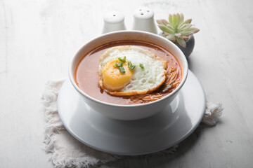 Sopa criolla a la minuta peruvian beef soup food with fried egg