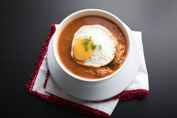 Sopa criolla a la minuta peruvian beef soup food with fried egg
