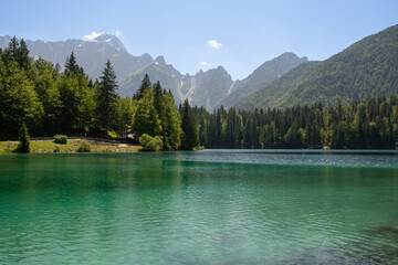 Italian lakes Laghi di Fusine. Turquoise lake with mountains in the background. Tarvisio, Italy,...