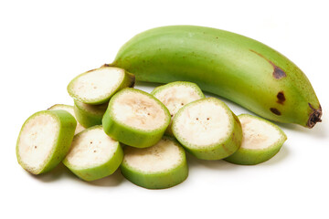 Group of unripe bananas (green) isolated on white background, unripe bananas are versatile and high in fiber. Top view of sliced banana inside, seeds and green banana peel.