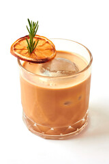 Ice ball coffee latte with rosemary and slice dry orange in glass isolated on white background.