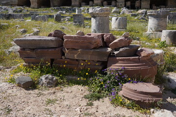 Fototapeta premium Ancient Greek columns parts at the archaeological site of Lindos Acropolis, Rhodes, Greece