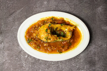 Boal Fish Bhuna korma karahi masala with gravy served in dish isolated on background top view of bangladesh food