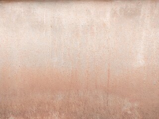 Walls that have been exposed to rain, stained with dirt, look old