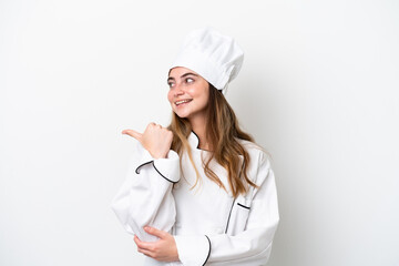 Young caucasian chef woman isolated on white background pointing to the side to present a product