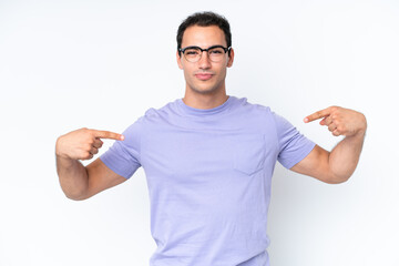 Young caucasian man isolated on white background proud and self-satisfied