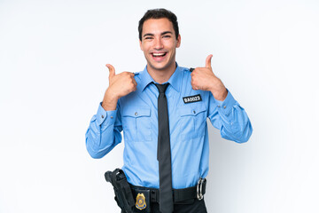 Young police caucasian man isolated on white background with thumbs up gesture and smiling