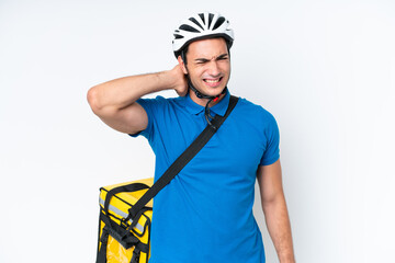 Young caucasian man with thermal backpack isolated on white background with neckache