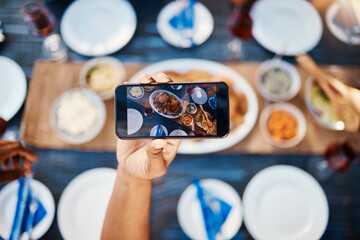 Phone photography, food and friends at a restaurant to relax on holiday vacation in summer together. Hands, social media post or influencer taking pictures or eating at table for lunch or brunch meal