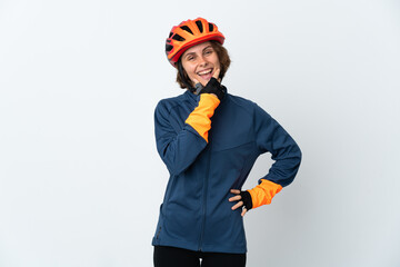 Young English cyclist woman isolated on white background happy and smiling
