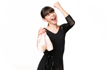 Little caucasian girl practicing ballet over isolated background celebrating a victory