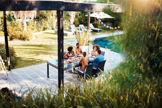 Hotel, friends or eating in outdoor restaurant to relax on holiday celebration or vacation in summer together. Party event, top or happy people speaking to bond at table for lunch food or brunch meal