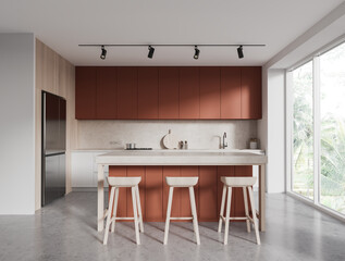 Cozy hotel kitchen interior with cooking and eating space, panoramic window