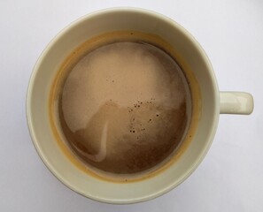 a cup of coffee on a white background