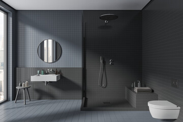 Dark stylish tile home bathroom interior with douche and sink, accessories