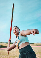 Woman, javelin and olympic athlete in competition, practice or sports training in fitness on...