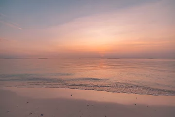 Deurstickers Peaceful tranquil sunset beach closeup. Abstract beach inspire motivation colorful sky calm waves horizon. Sea bay clouds. Idyllic summer seaside landscape. Mediterranean tropical relaxation coast © icemanphotos