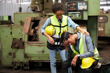 workers or engineer feeling sad after losing a job in the factory