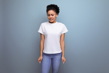 pretty owner of curly hair woman in a white T-shirt. clothing for identity and branding