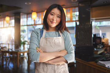 Portrait, asian woman and small business entrepreneur of restaurant with arms crossed for...
