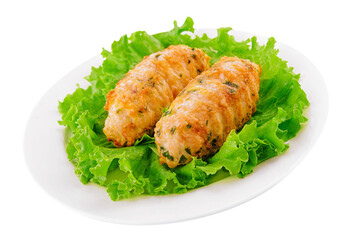 Chicken cutlets with salad greens on plate