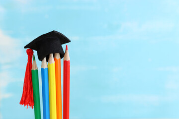 Back to school or education concept. graduation hat on pencils