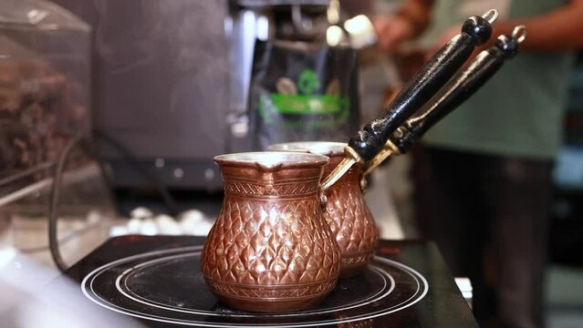 making coffee on a stove
