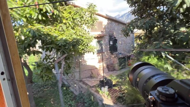 Shooting camera in front of the sea of Soller