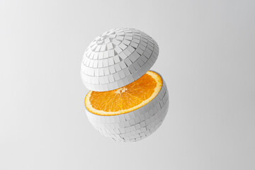 Creative concept of summer fruits. Mirrored white disco ball with orange inside on white background.