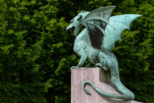 LJUBLJANA, SLOVENIA, May 07, 2023. The Dragon Bridge is one of the most recognizable and iconic landmarks of Ljubljana, the capital of Slovenia. A detail of the bridge are bronze statues of dragons. 