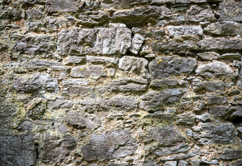 Fototapeta premium Stone wall pattern, natural stone texture, ground pavement background