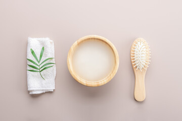 Homemade cosmetic rice water with ingredients on beige background, healthy beauty treatment ingredients for homemade comsetics, beauty recipe for home spa, natural skincare preparation, close up