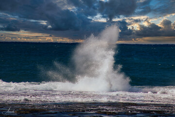 waves crashing on the rocks
