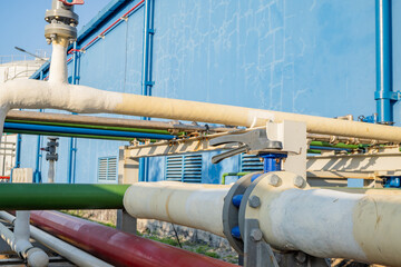 Butterfly manual Valve on the waste water pipe line. The photo is suitable to use for industry background photography, power plant poster and electricity content media.