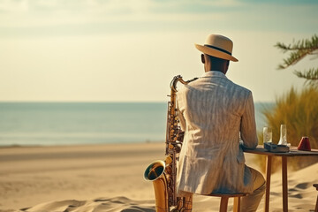 A saxophonist playing on the beach