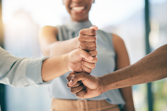 Fist bump stack, support or business people for motivation, teamwork or mission in collaboration. Partnership, hands closeup or employees meeting in huddle with goal, vision or solidarity together