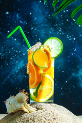 Fresh summer cocktail with lime and oranges.